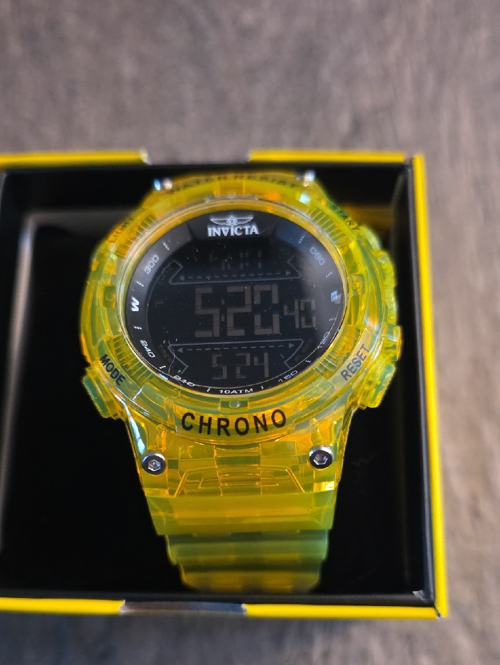 51. Invicta Yellow Transparent Digital Chronograph Watch